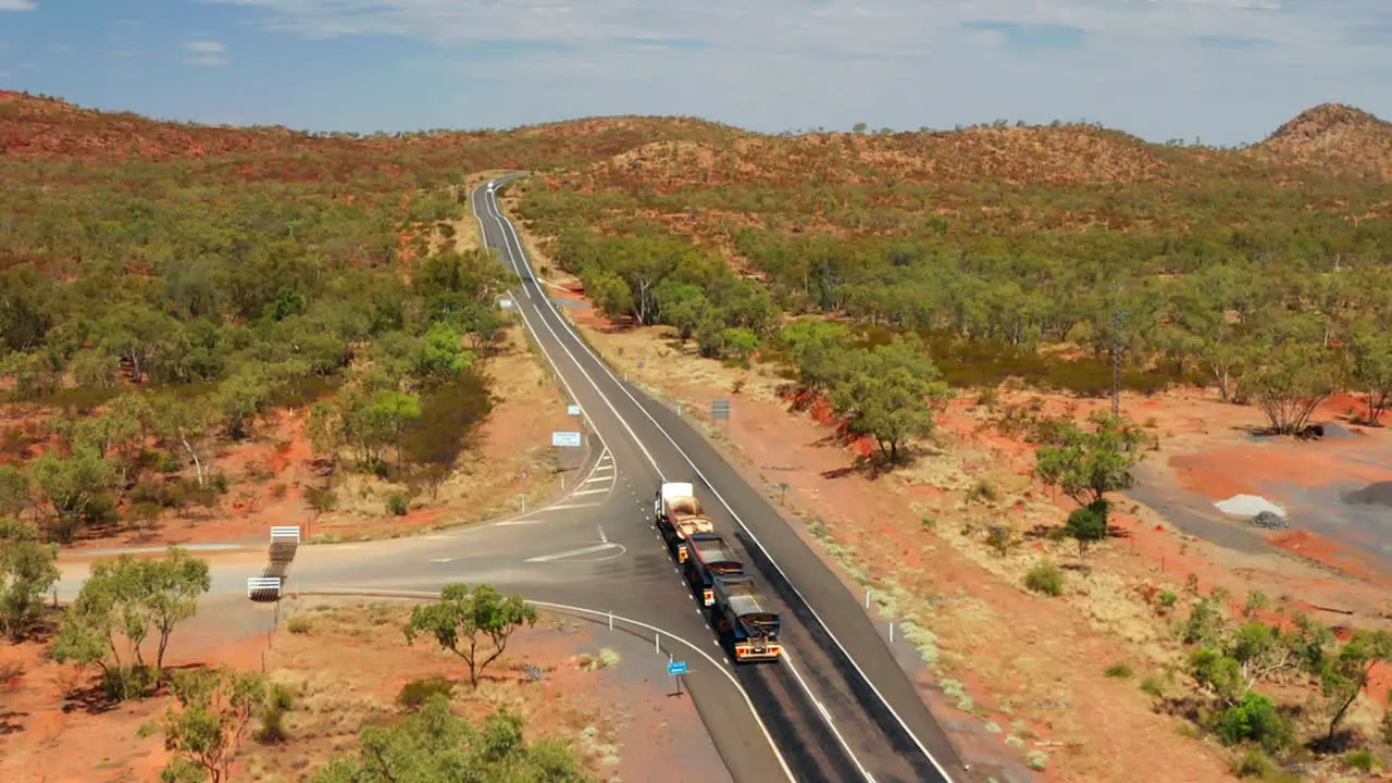 Three-trailer Road Train Driving On The Highway In Queensland Outback Australia