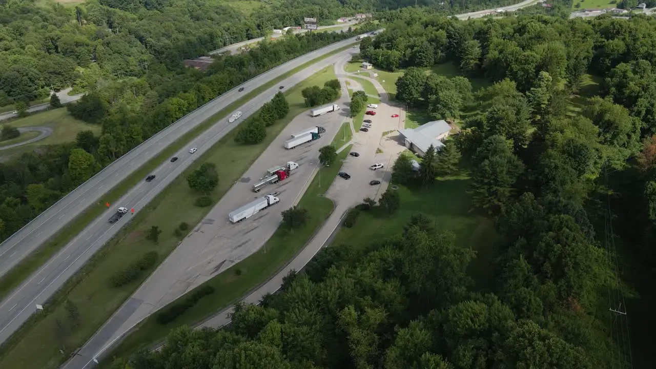 Interstate 79 in West Virginia at Rest Stop Pan Up Toward Mountain Range Aerial View