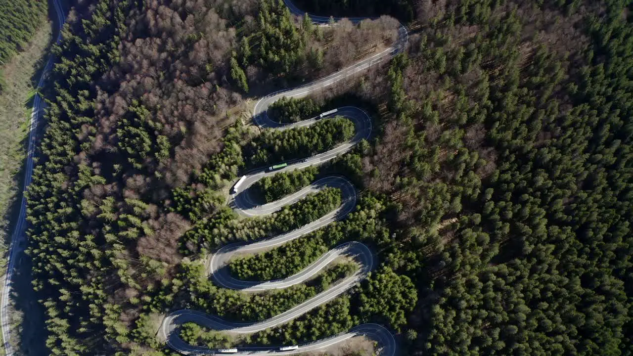 Dramatic bird's eye view of switchbacks on road over Bratocea Pass Romania