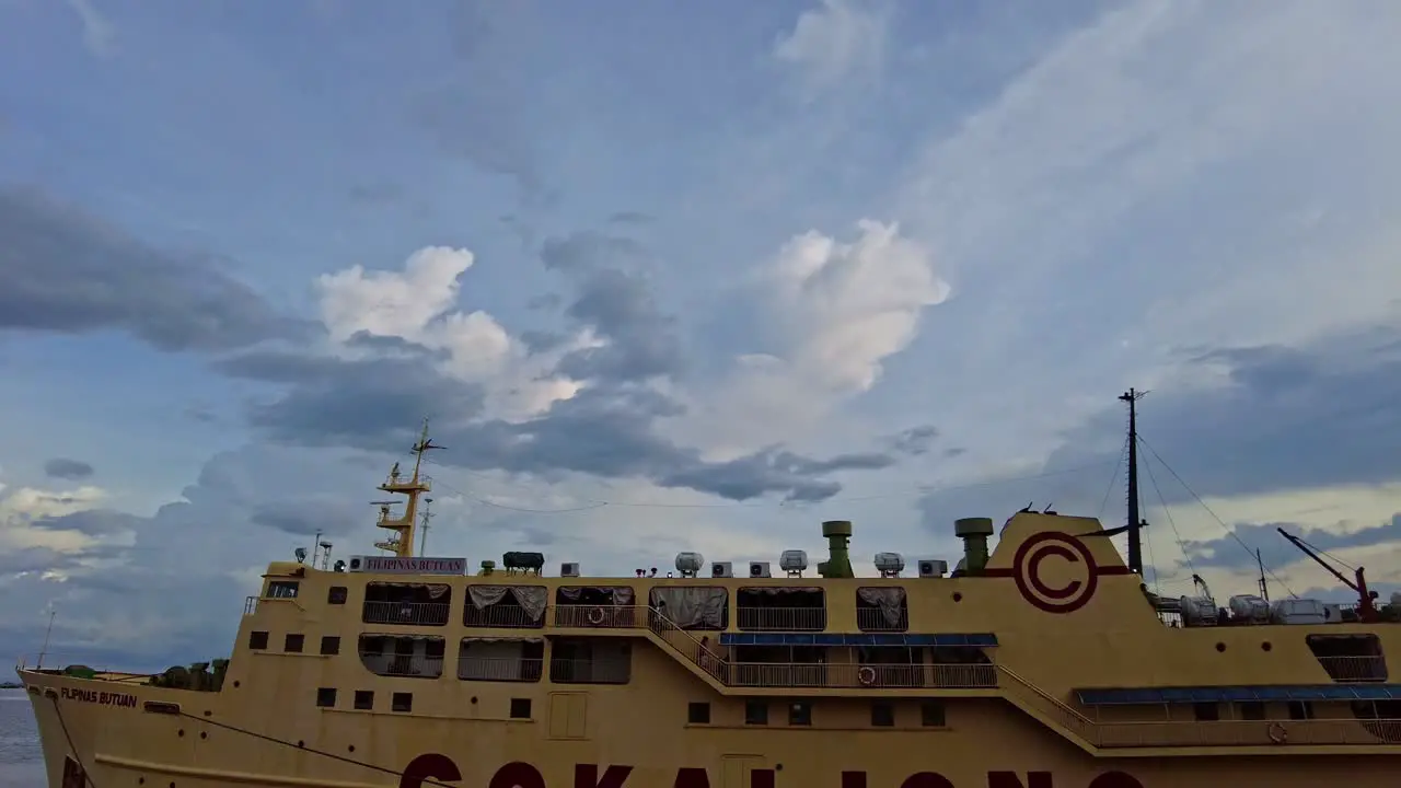 Tilt down shot of one of Cokaliong Shipping Lines Ferries Docked in Cebu Port in the Philippines