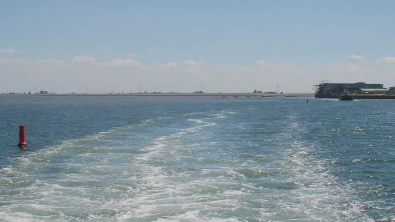 Open sea on a boat with a horizon on a summer day in slowmotion