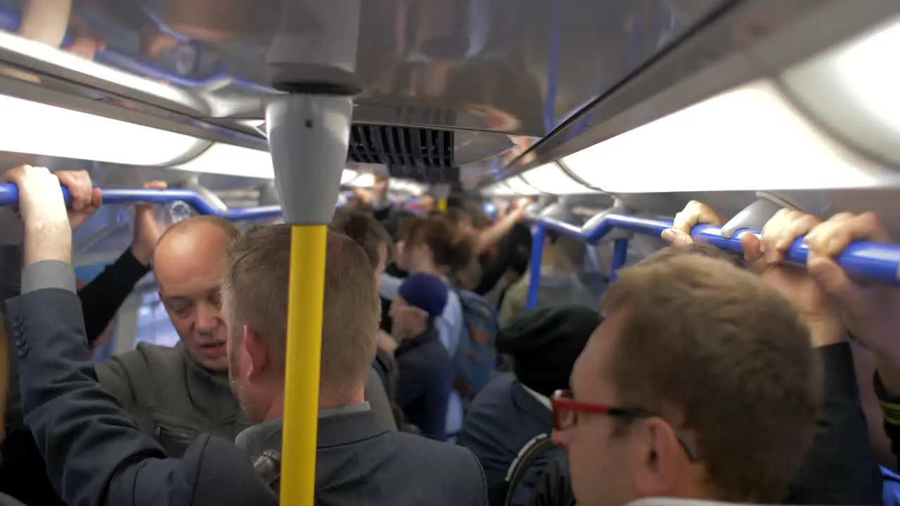 4K Crowded Metro System Slow Motion People Waiting Public Transit London