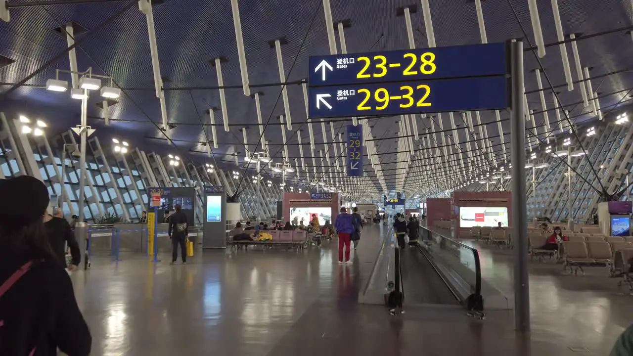 View inside the departing terminal of Shanghai Pudong International Airport with many passengers before covid19 outbreak