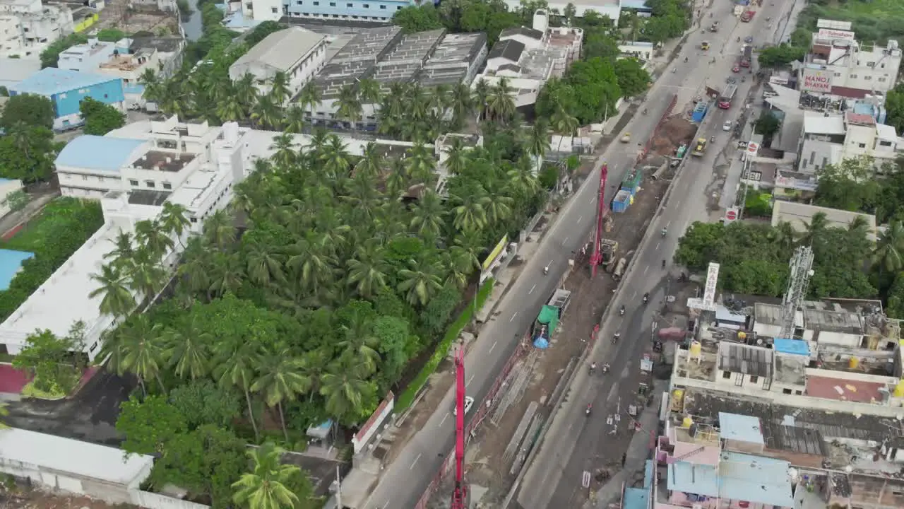 Cinematic drone view of bridge construction in a Indian metro