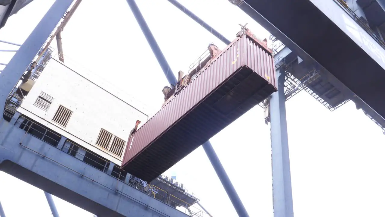 Container is being moved from one place to another thorough heavy machinery at Karachi Port