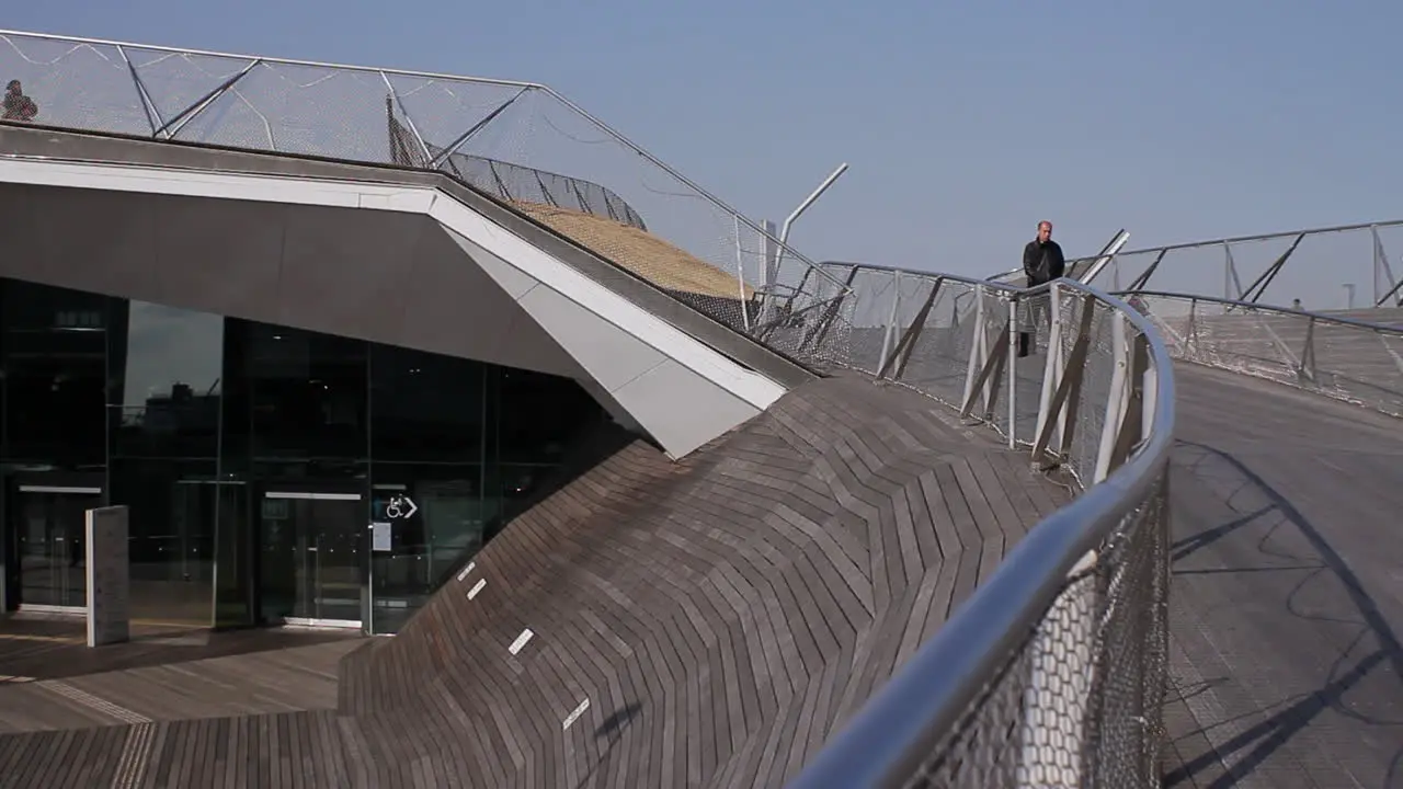 A man walking down on the teak deck of Yokohama International Port Terminal