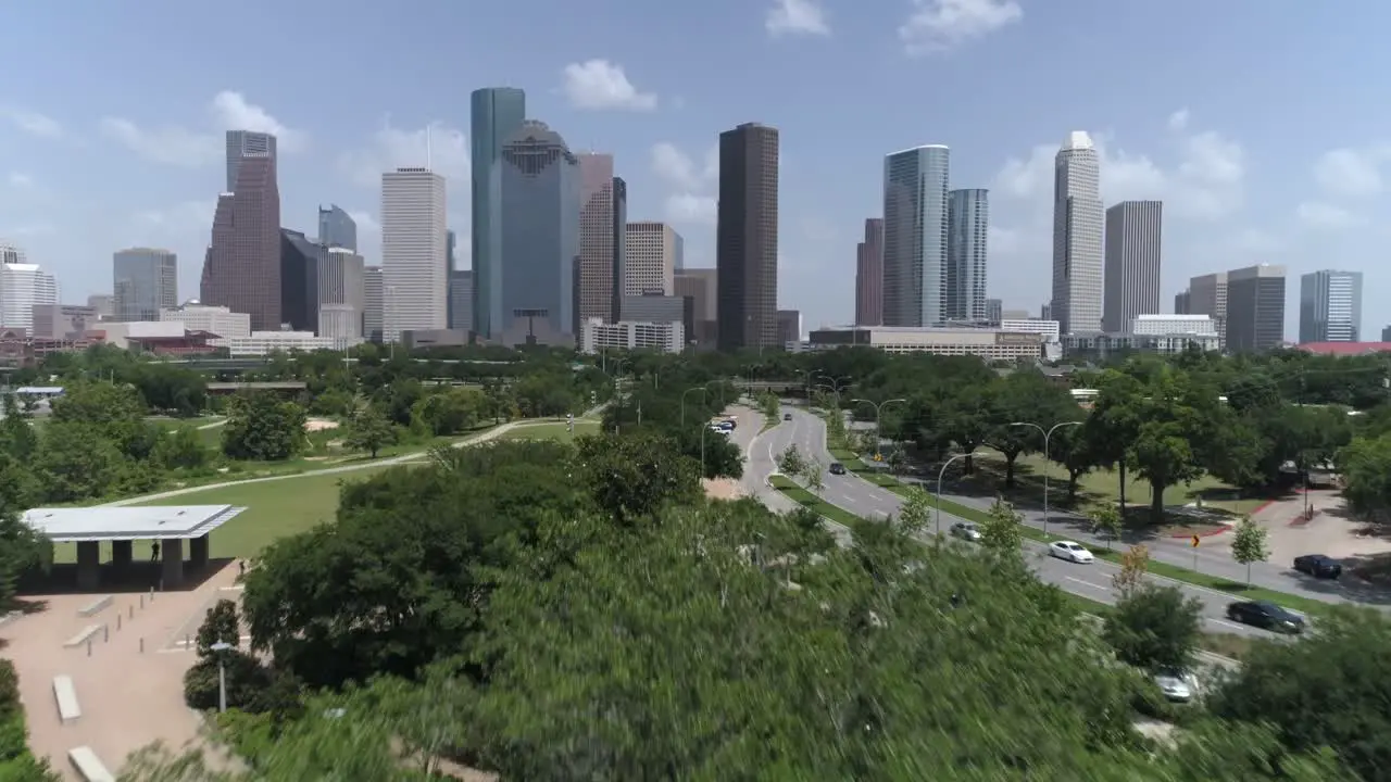 This video is about an aerial of downtown Houston skyline across from Elanor Tinsley Park