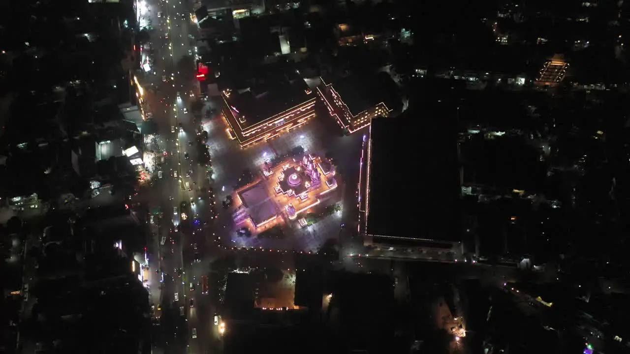 Rajkot aerial drone view Many vehicles are heading towards the road near the temple