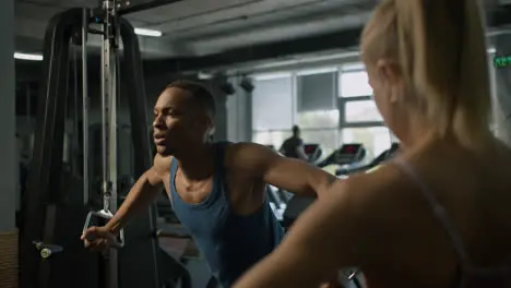 Front view of an athletic african american man in the gym