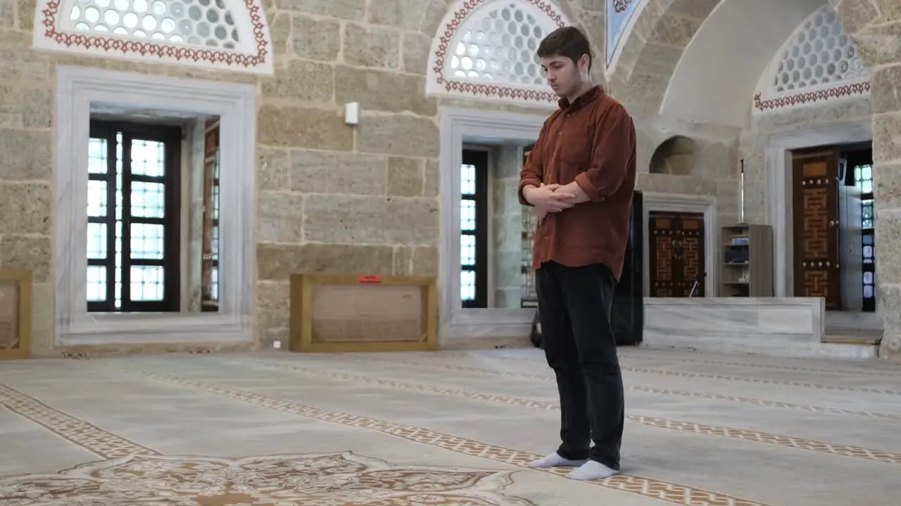 Standing prayer in mosque