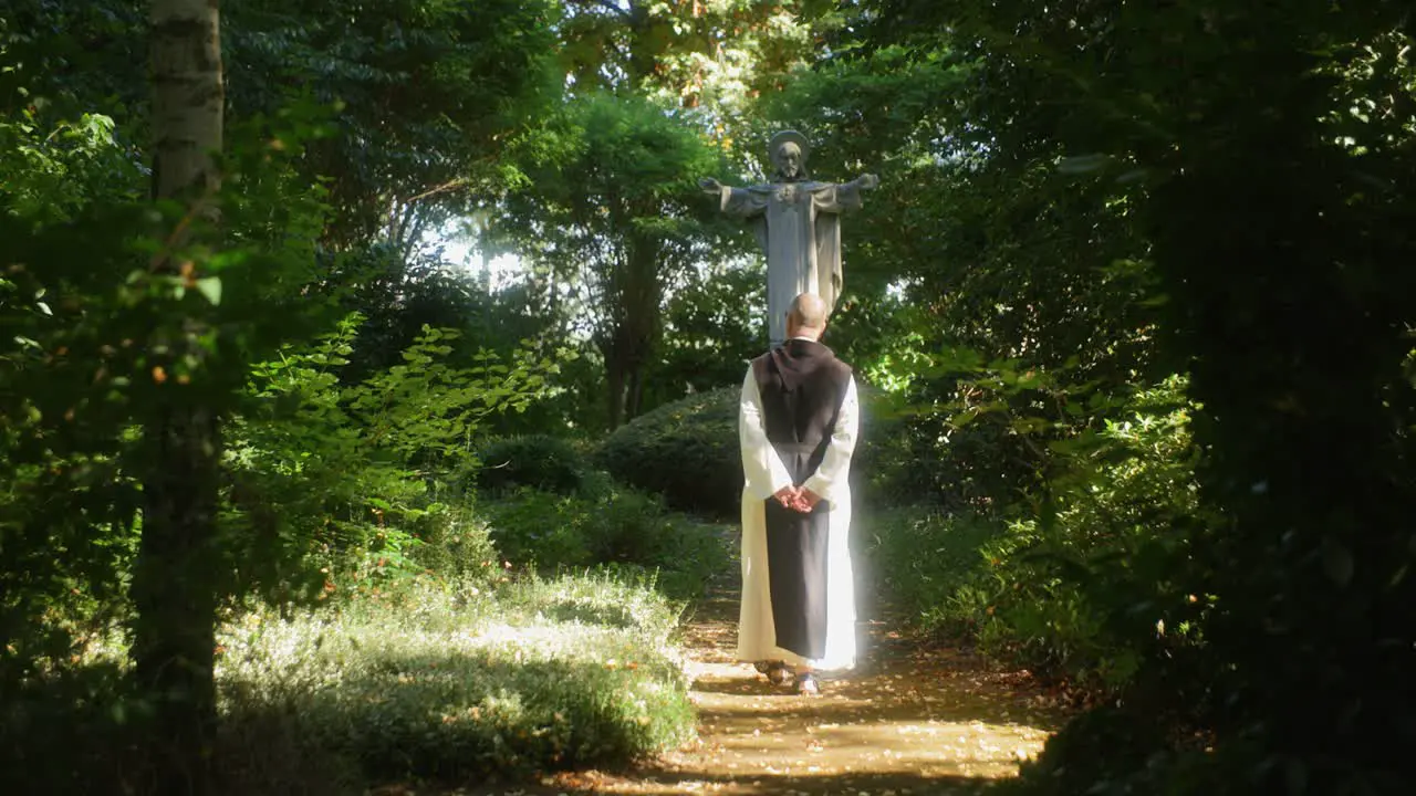 Amazing scenery of a monk walking in the forest