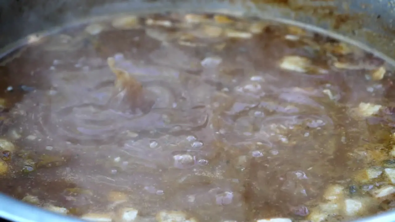 The soup is simmered in a pot slow motion