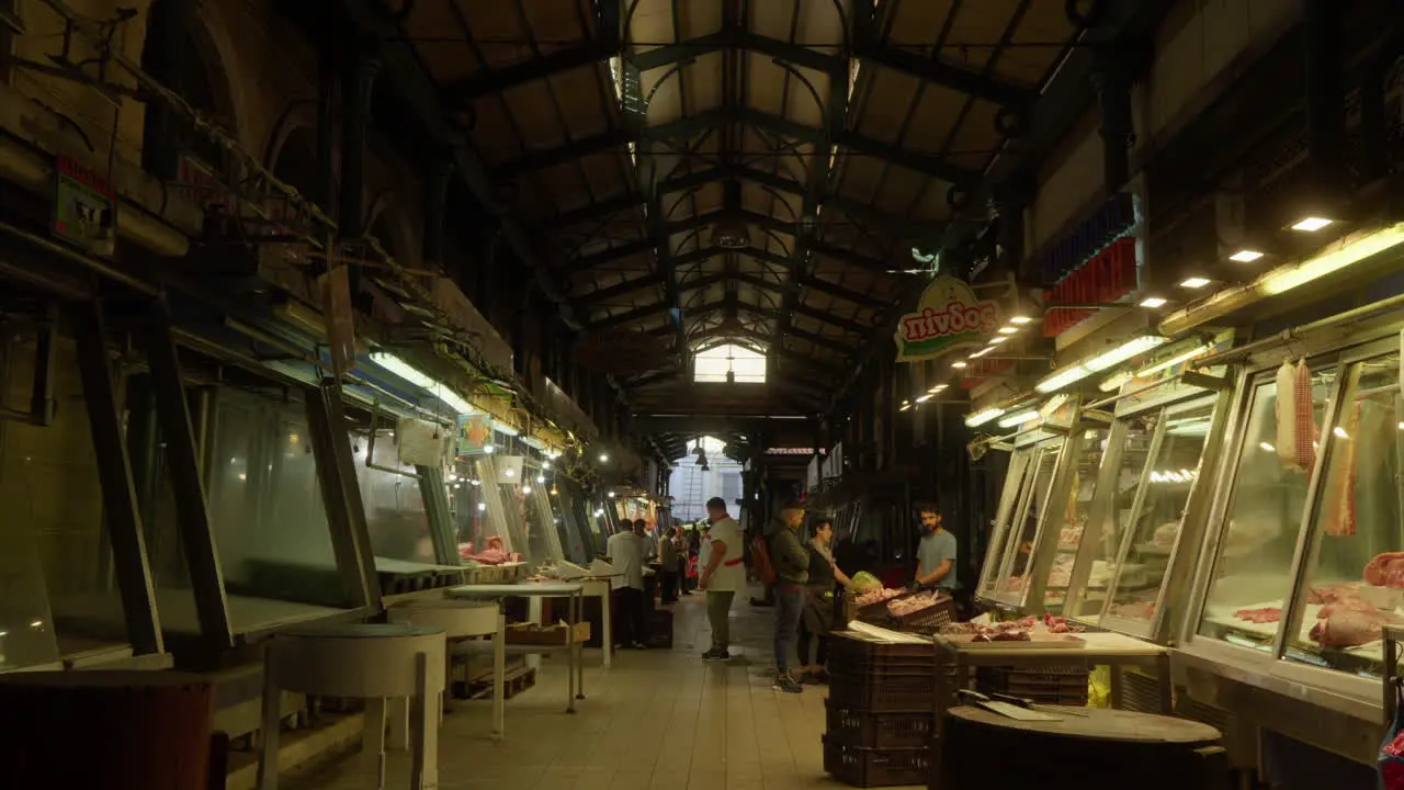 Bustling market scene inside an Athens bazaar with vendors and shoppers