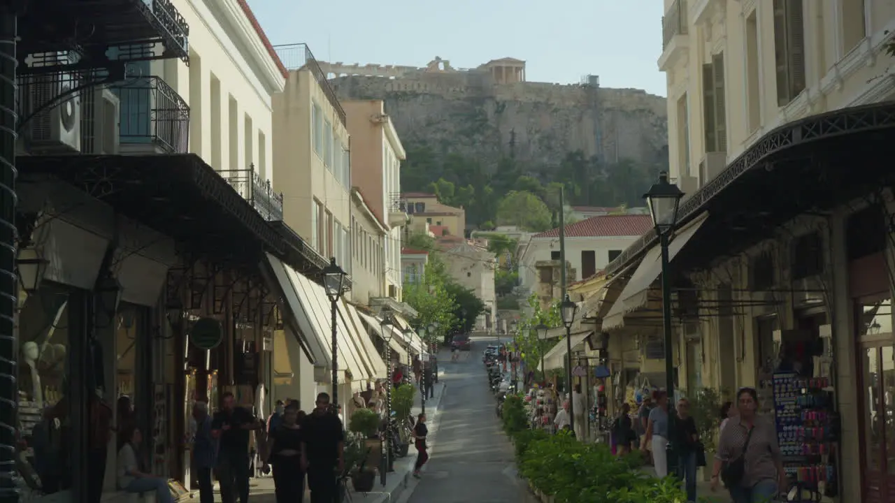 Busy street in Athens with Acropolis view