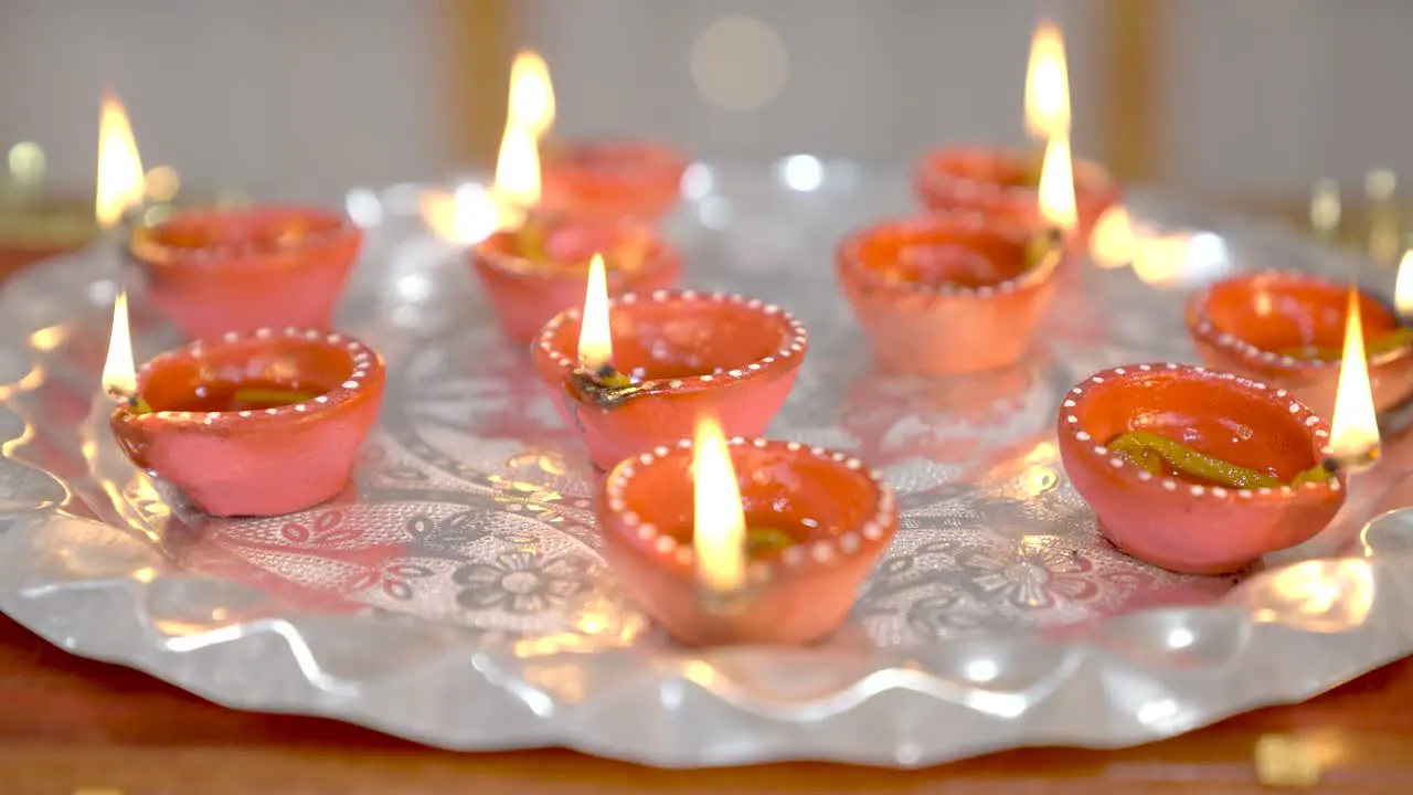 Diwali festival preparations Burning earthen lamps