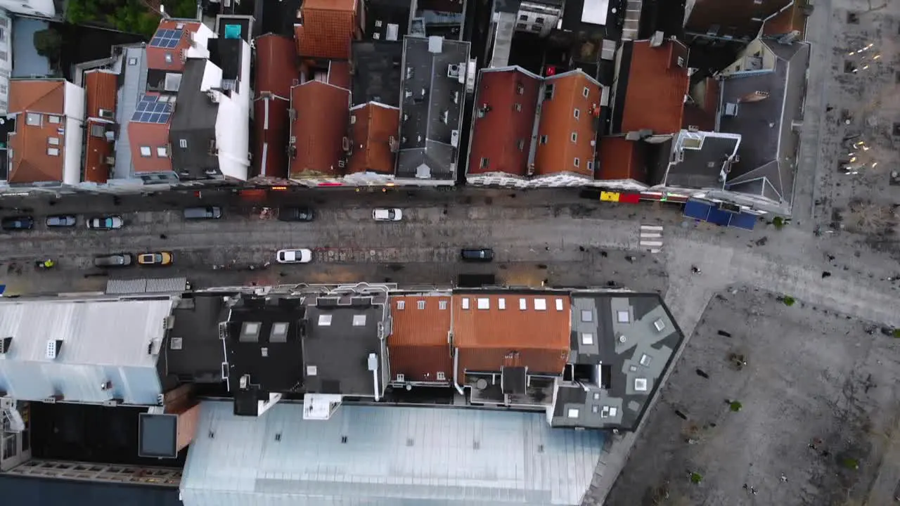 Aerial birds eye view flight over Brussels' city buildings on cloudy day Belgium