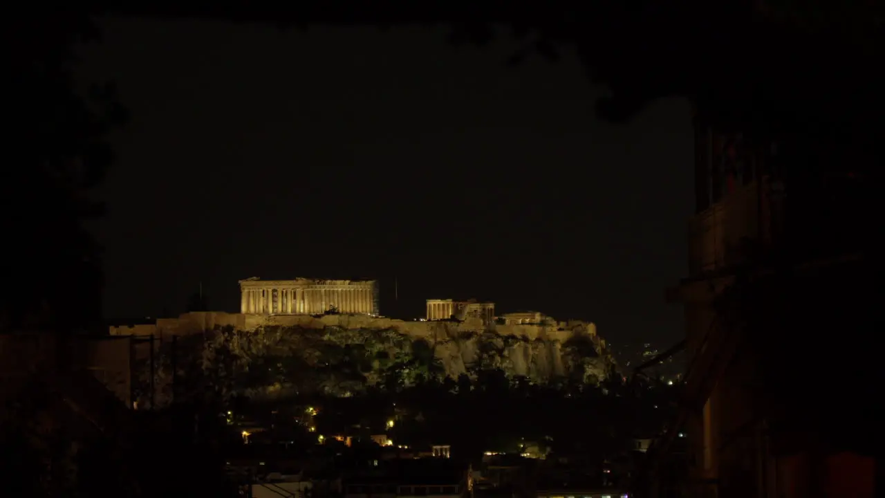 Illuminated Acropolis view at night in Athens