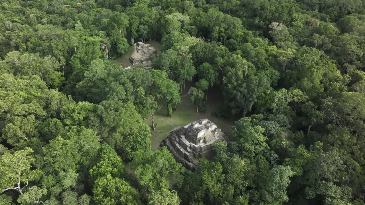 Aerial view of Maya Ruins of Yaxha in jungle near Tikal drone