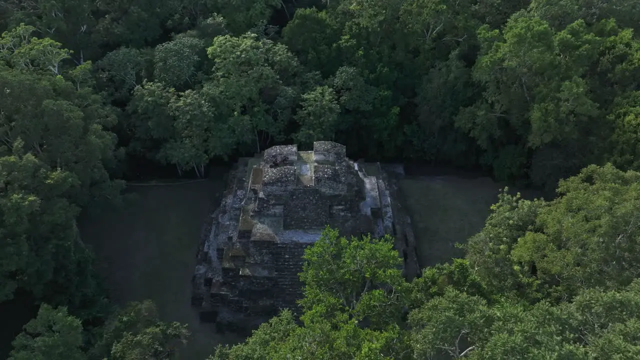 Famous temple ruins at Yaxha Guatemala filmed from above aerial