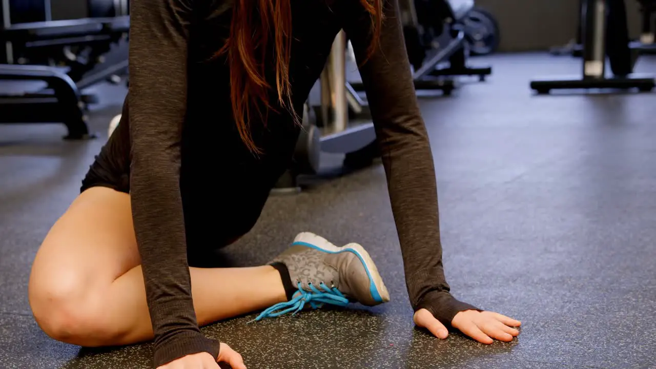 Woman exercising in fitness studio 4k