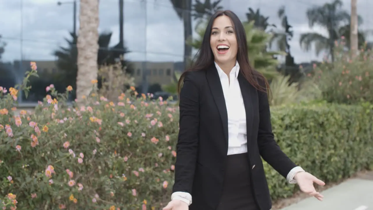 Laughing stylish young woman