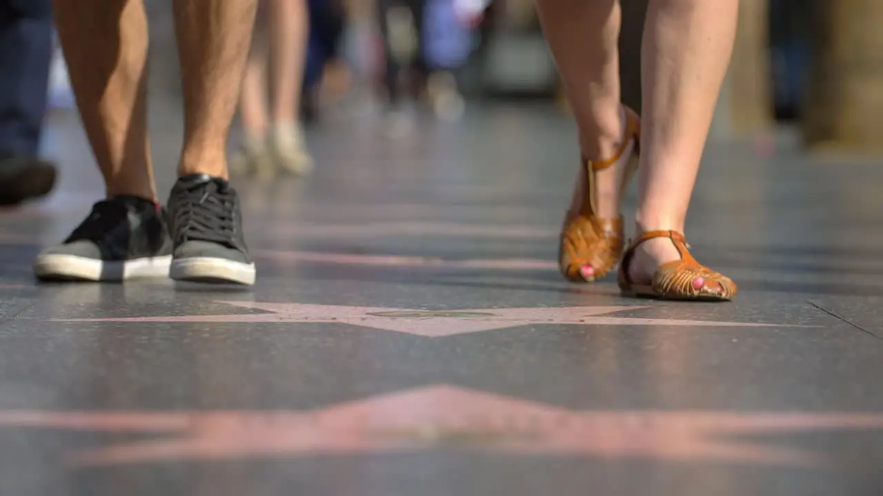 Feet on Hollywood Walk of Fame