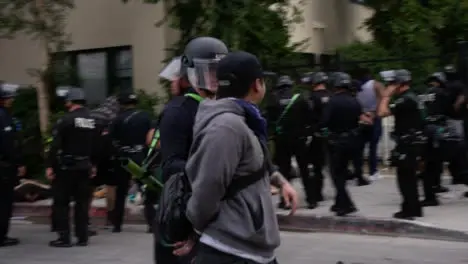 Hollywood Arrested Protester Talking to Police Officer