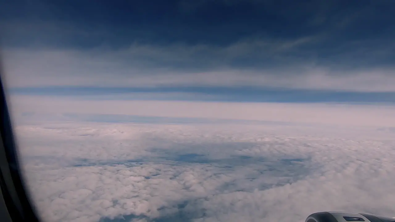 Looking at the clouds and Da Nang city in the airplane in Asia