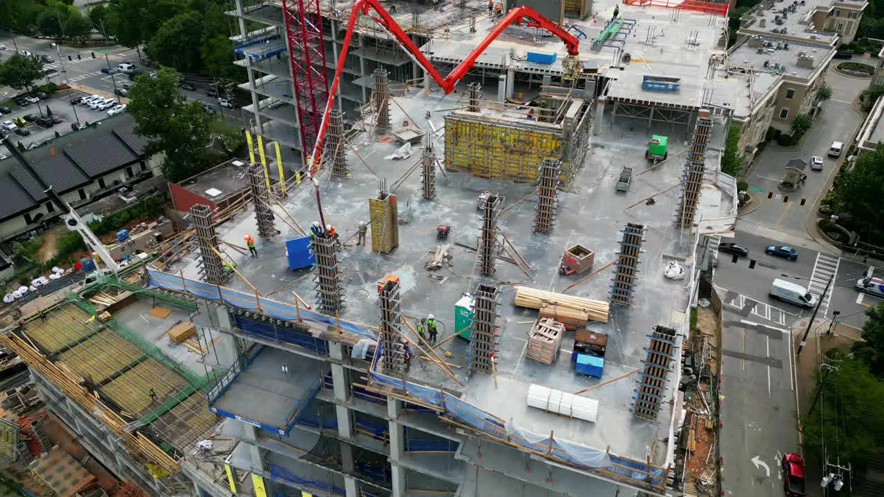 High angle view of casting concrete load structures on multistorey building construction site