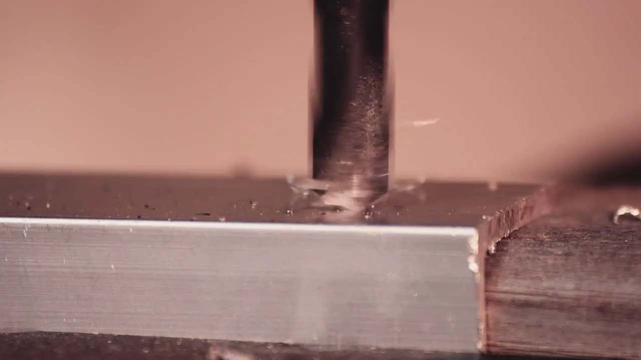 Drilling aluminium block with very sharp drillbit metal scraps taking off