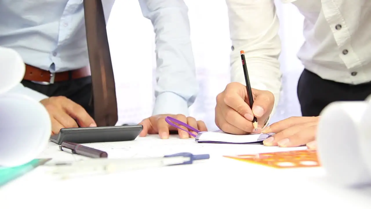 Architect Mans Hands Working Plan At Modern Office