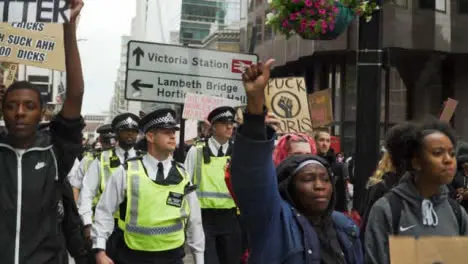 London Protesters Chant Beside Police Officers