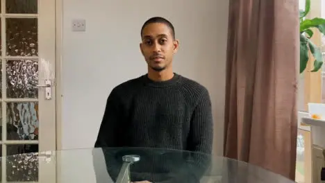 Young Male Therapist On a Video Call Listening Intently to Patient