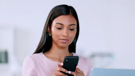 Trendy female entrepreneur smiling while talking