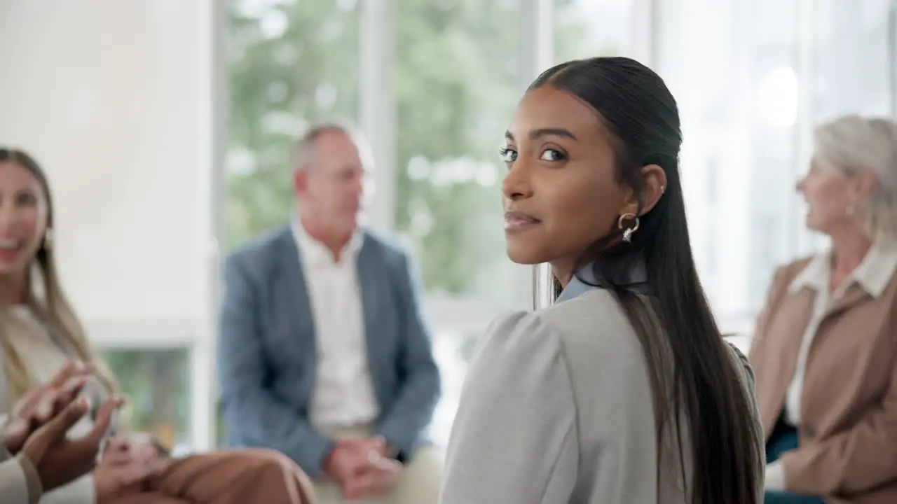 Portrait of woman in group in therapy