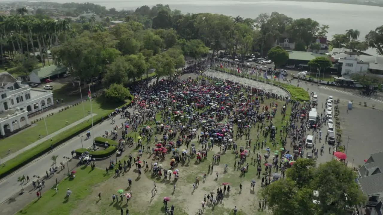 Protest in Suriname in February against the government drone descending camera tilt