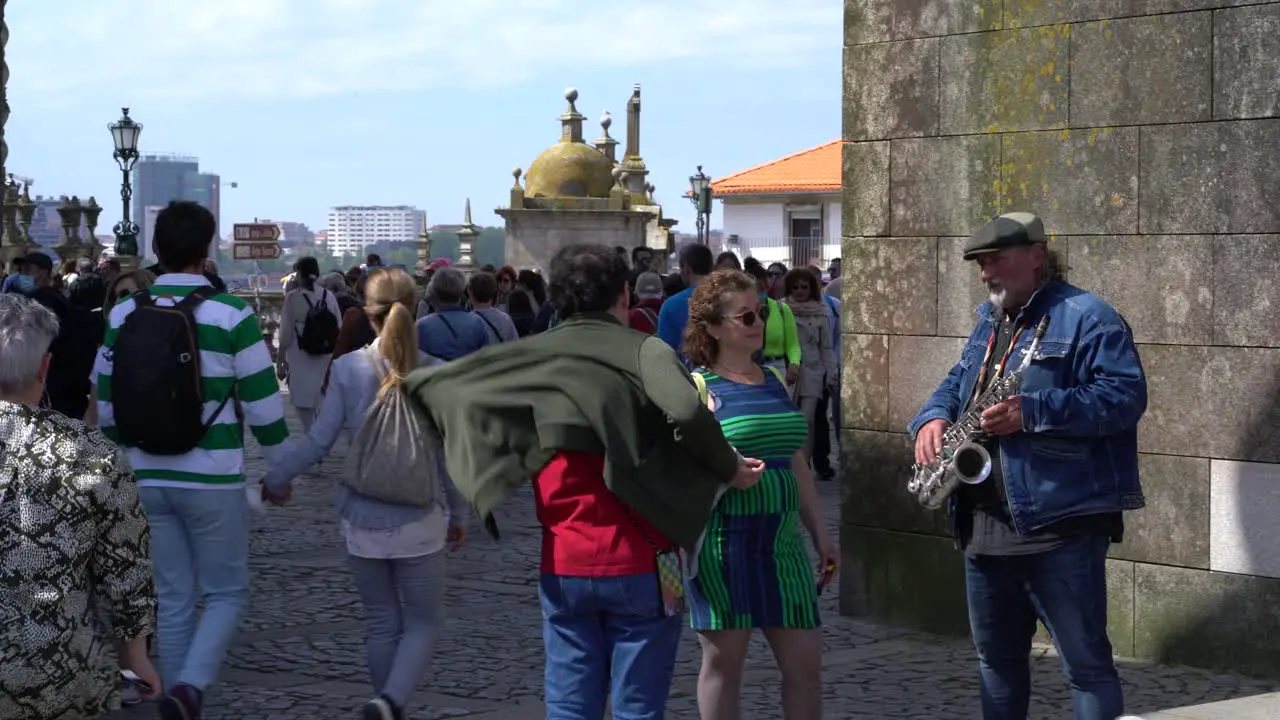 Crowd of tourists at Terreiro da Sé during Easter long weekend Porto Portugal