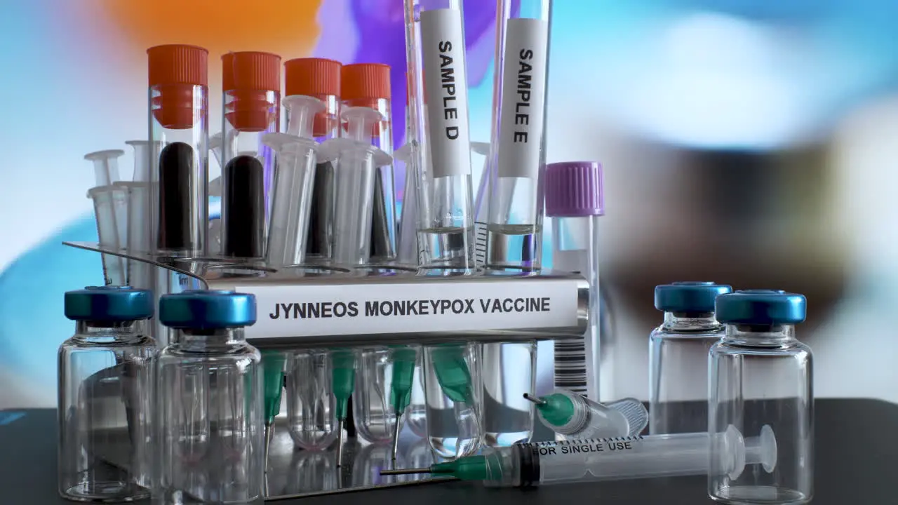 JYNNEOS Monkeypox Vaccine Samples Being Removed From Metal Test Tube Rack