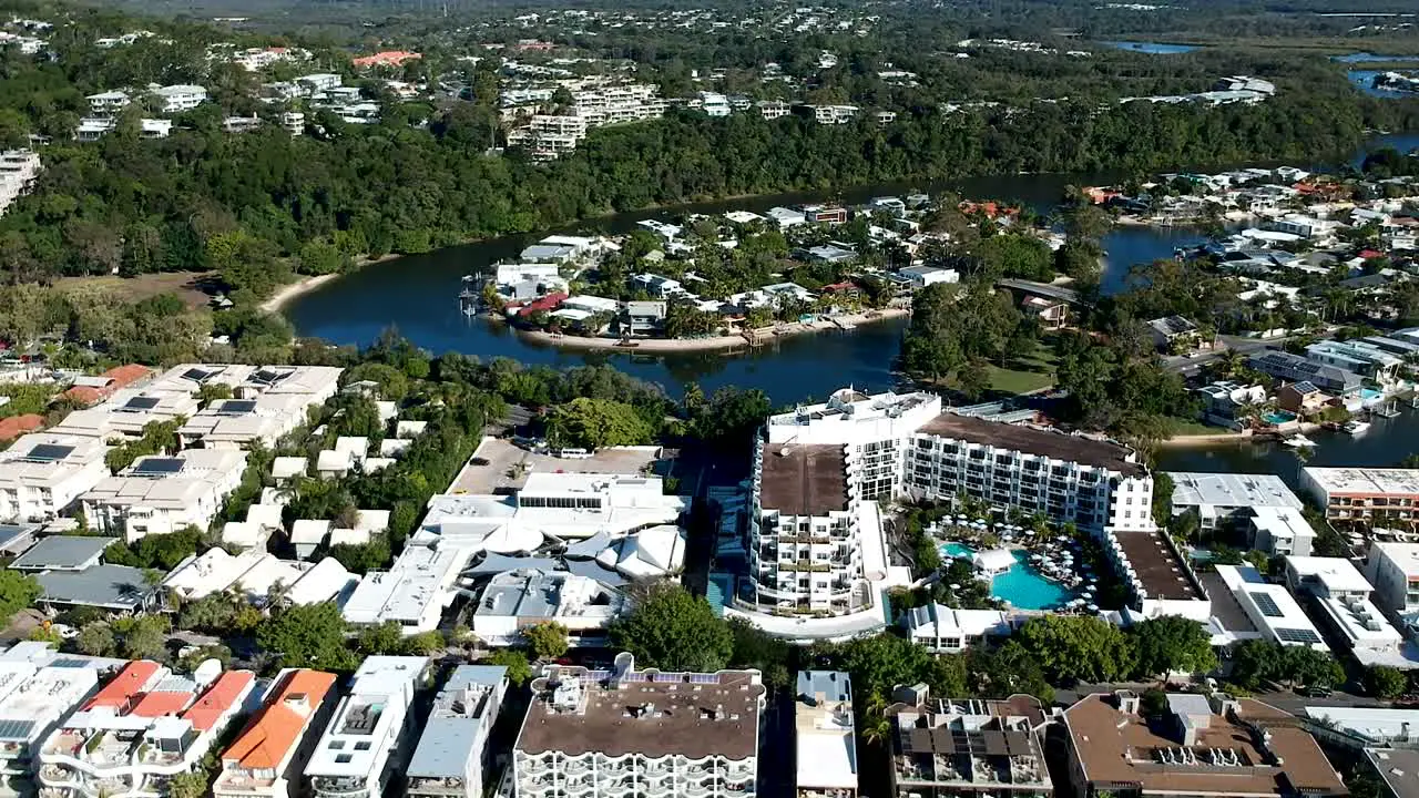 aerial pan along Noosa main Beach and Noosa town Noosa Heads Queensland Australia