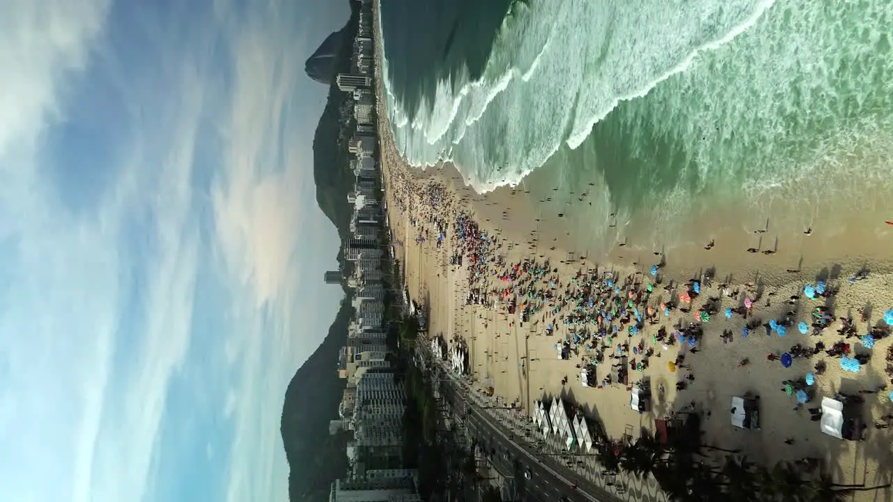 Crowded Copacabana Beach on Summer Day in Rio de Janeiro Brazil Vertical Aerial