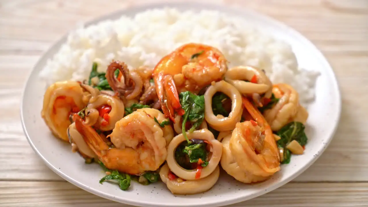 rice and stir-fried seafood with Thai basil Asian food style