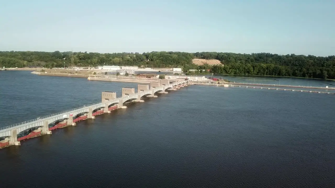 Wide aerial view of Lock and Dam 14 on the Mississippi River on a sunny summer day near Hampton Illinois