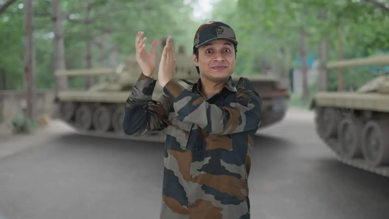 Happy Indian army man clapping and appreciating