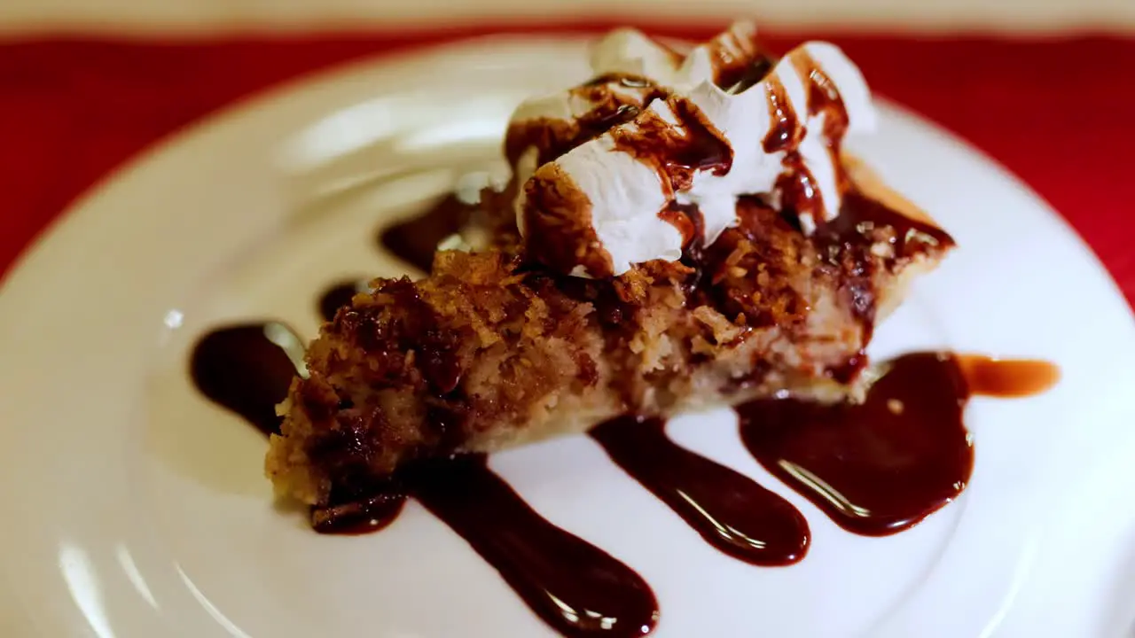 Pie with Whipped Cream and Chocolate Sauce