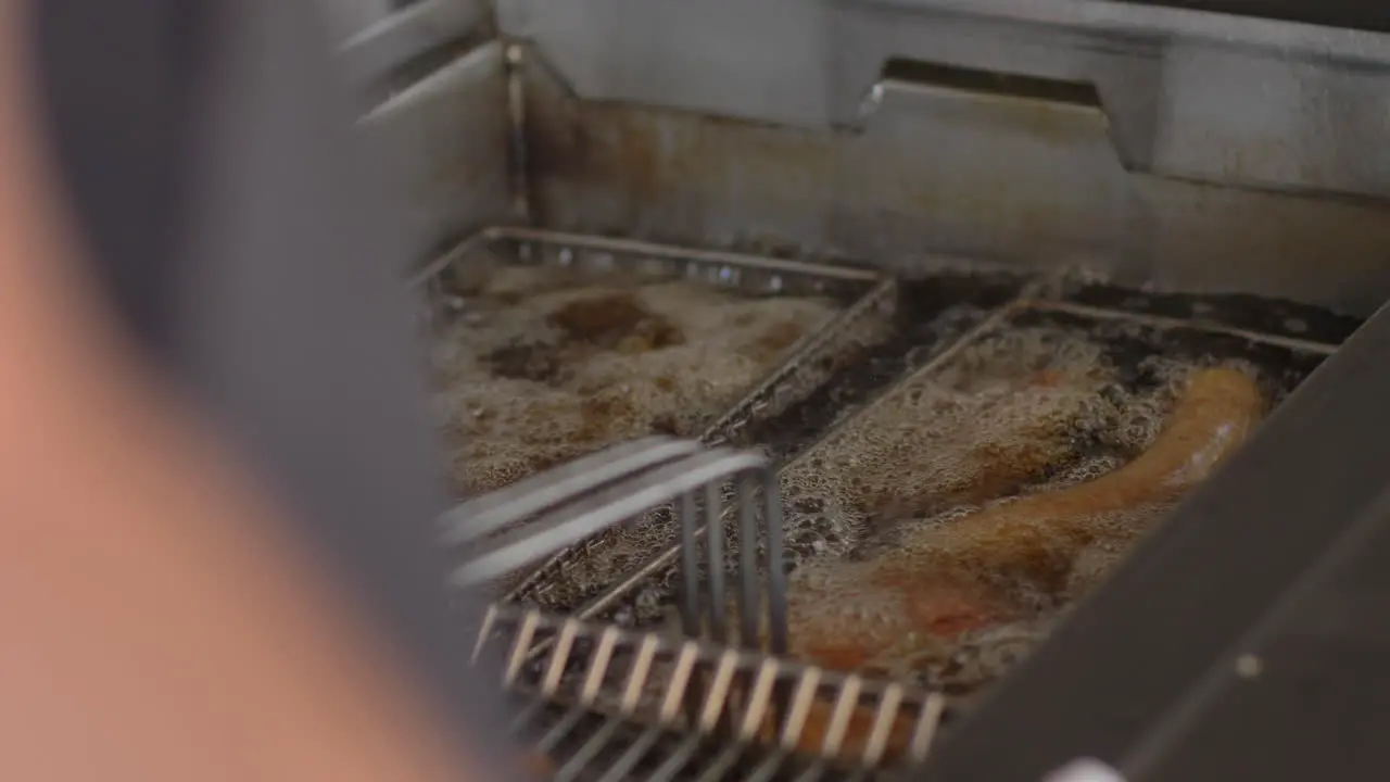 Deep-frying some snacks at a party