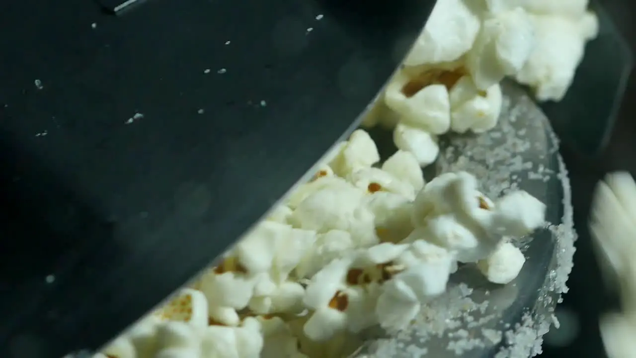 popcorn popping from a popcorn machine close up