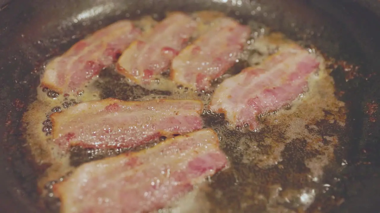 Bacon Sizzling In Pan While Cooking