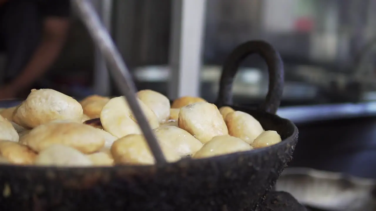 A delicious local street food Kachori being prepared in a Local market in North India