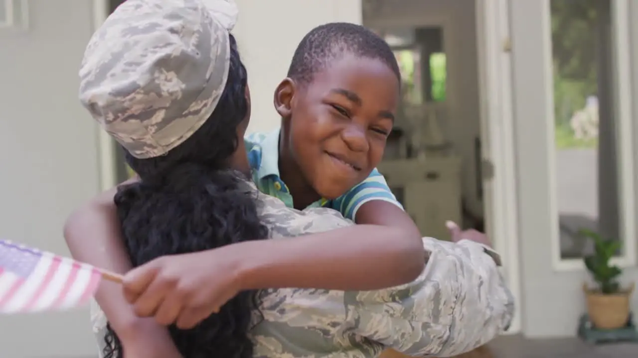 Montage of african american female and male soldiers embracing children