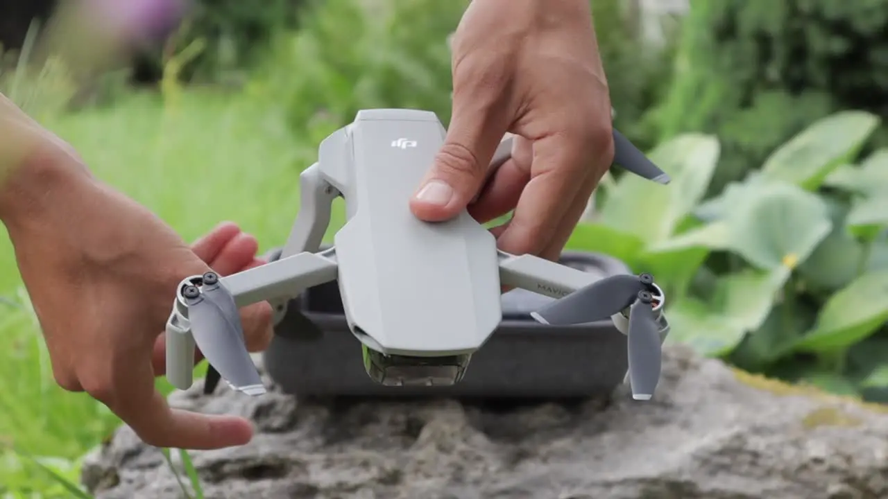 Drone being unfolded and prepared for flight